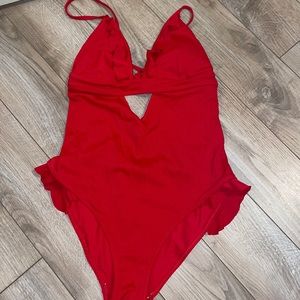 One piece red bathing suit